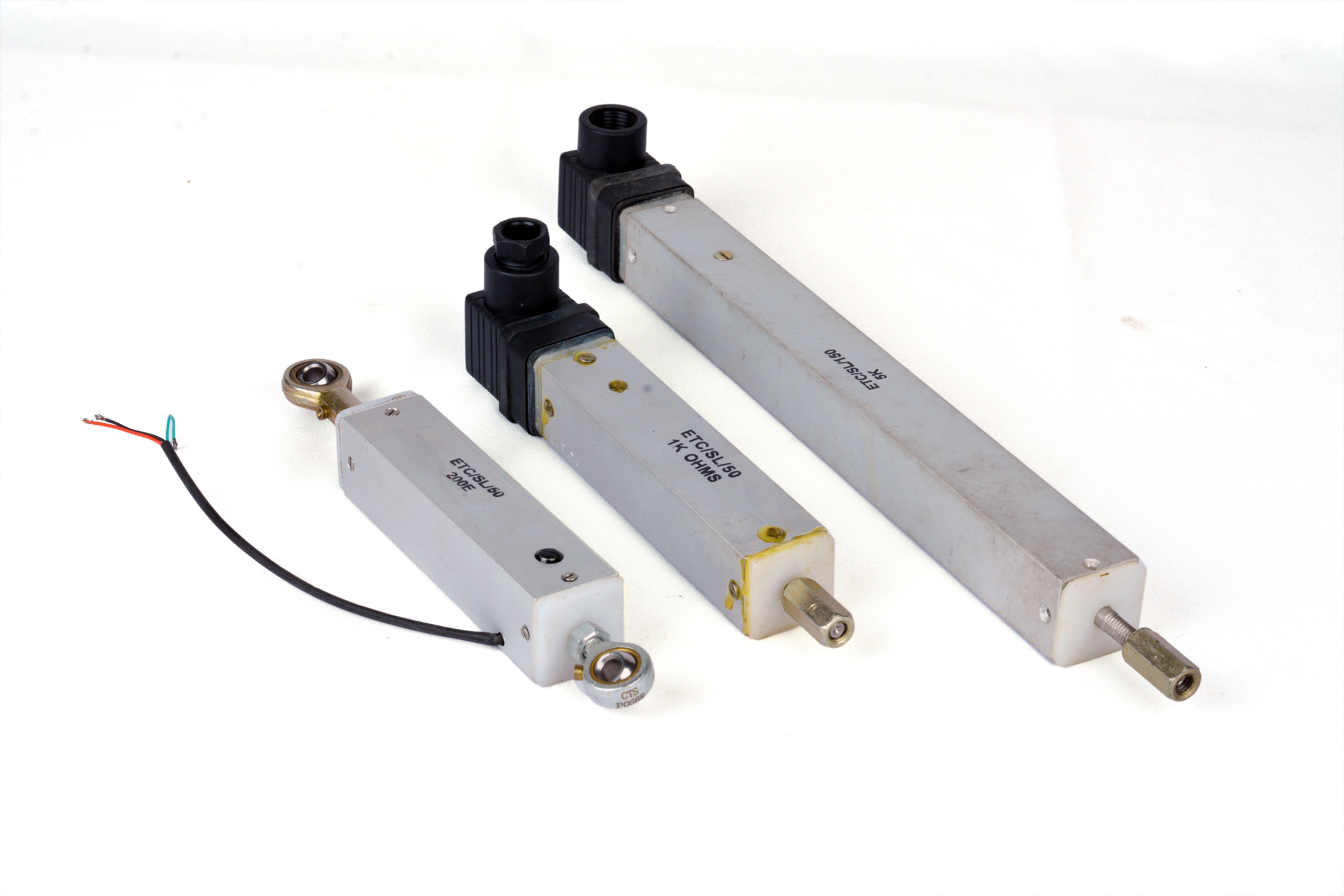 Three sizes of ETCC linear potentiometers — compact to long stroke